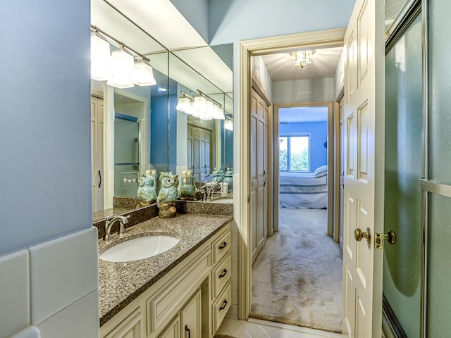8621 Basswood Rd Unit 33, Eden Prairie, MN 55344 - full bathroom with an enclosed shower, ensuite bath, a notable chandelier, and vanity
