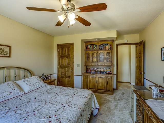 8621 Basswood Rd Unit 33, Eden Prairie, MN 55344 - bedroom featuring light carpet and ceiling fan