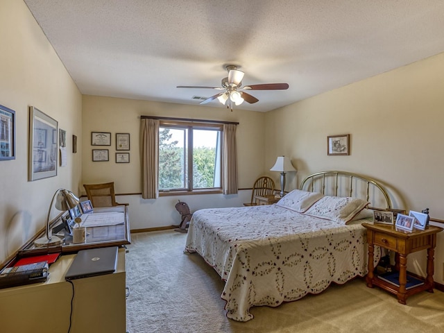 8621 Basswood Rd Unit 33, Eden Prairie, MN 55344 - carpeted bedroom featuring baseboards, visible vents, a ceiling fan, and a textured ceiling
