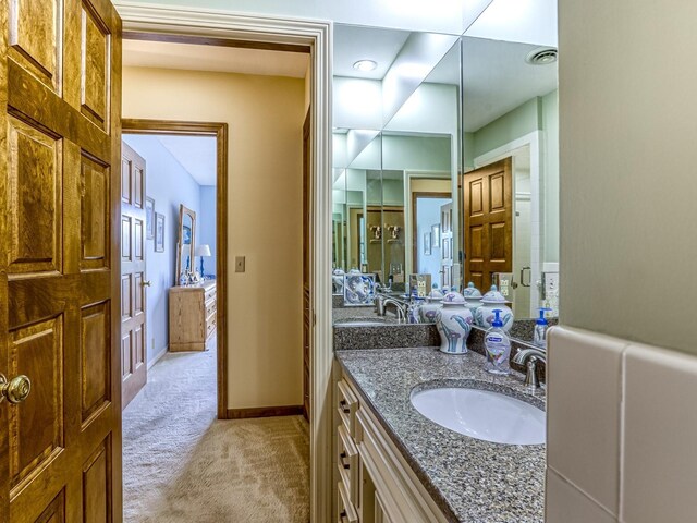 8621 Basswood Rd Unit 33, Eden Prairie, MN 55344 - full bathroom with baseboards and vanity
