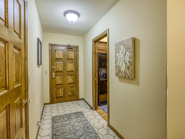 8621 Basswood Rd Unit 33, Eden Prairie, MN 55344 - interior space featuring baseboards and a textured ceiling