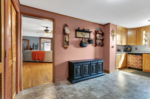 interior space featuring baseboards and a textured ceiling
