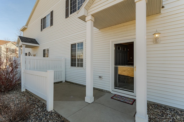 entrance to property with a patio