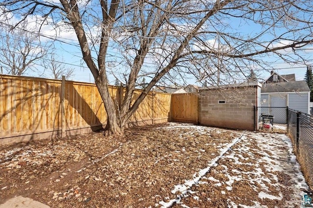 view of yard featuring a fenced backyard