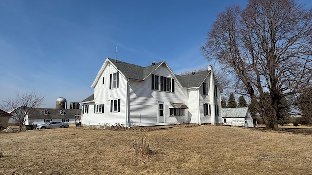 exterior space with a front yard