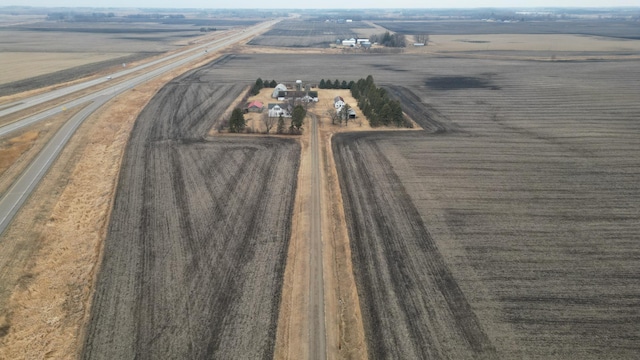 birds eye view of property featuring a rural view