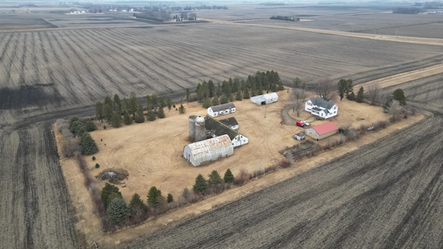 birds eye view of property featuring a rural view