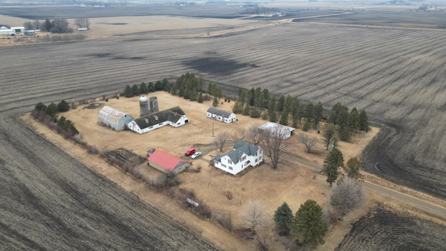 birds eye view of property featuring a rural view