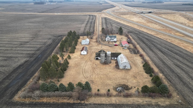 birds eye view of property featuring a rural view