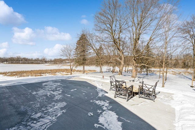 view of yard covered in snow