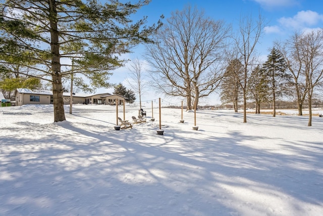 view of snowy yard