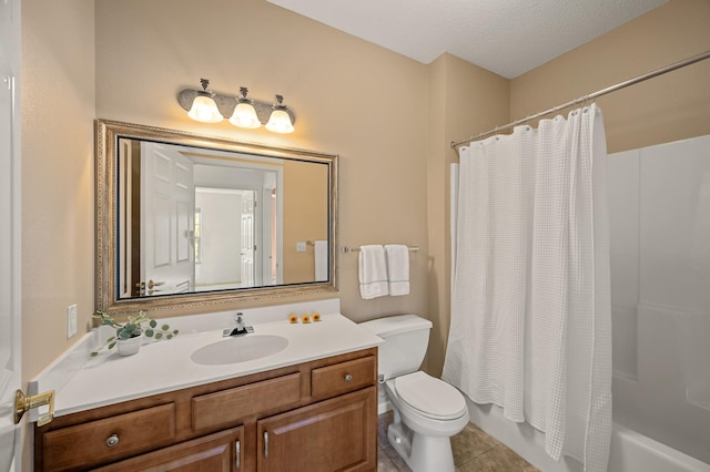 bathroom featuring vanity, tile patterned floors, shower / bath combo, and toilet