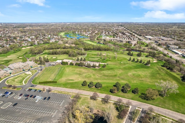 birds eye view of property featuring a residential view, a water view, and golf course view