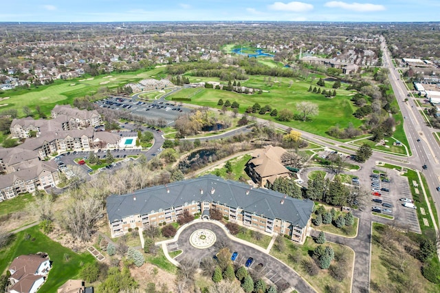 birds eye view of property with golf course view