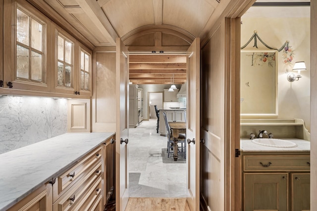 781 Ferndale Rd N, Orono, MN 55391 - interior space with vaulted ceiling, marble finish floor, and a sink