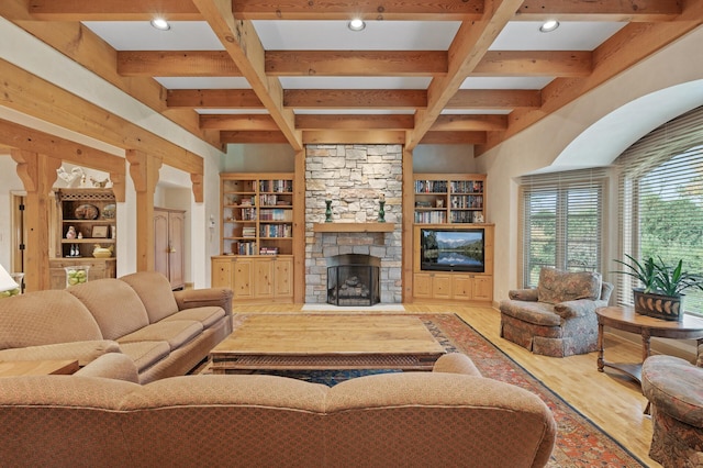 781 Ferndale Rd N, Orono, MN 55391 - living area featuring coffered ceiling, wood finished floors, a fireplace, and beamed ceiling