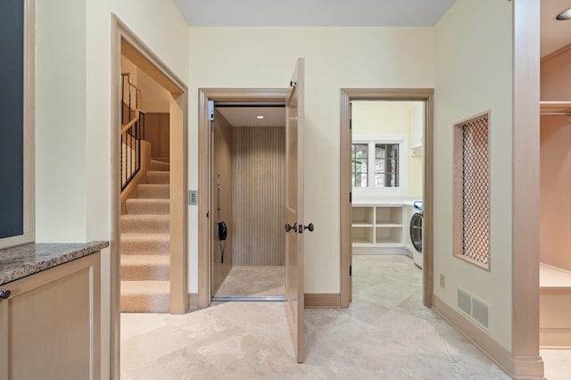 781 Ferndale Rd N, Orono, MN 55391 - bathroom featuring washer / clothes dryer, baseboards, and visible vents
