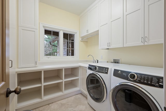 781 Ferndale Rd N, Orono, MN 55391 - washroom with a sink, cabinet space, washing machine and dryer, and light tile patterned floors