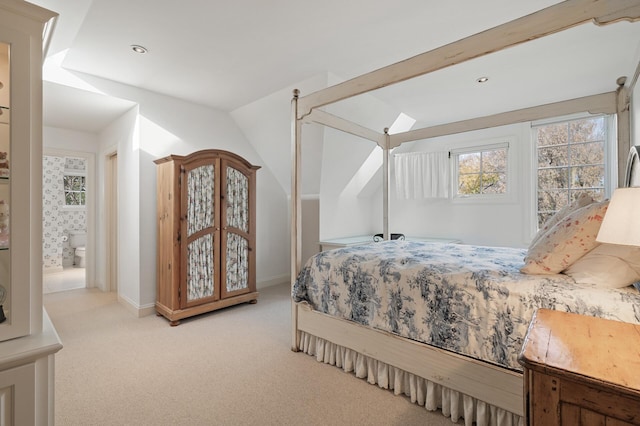 781 Ferndale Rd N, Orono, MN 55391 - carpeted bedroom with vaulted ceiling, baseboards, and multiple windows