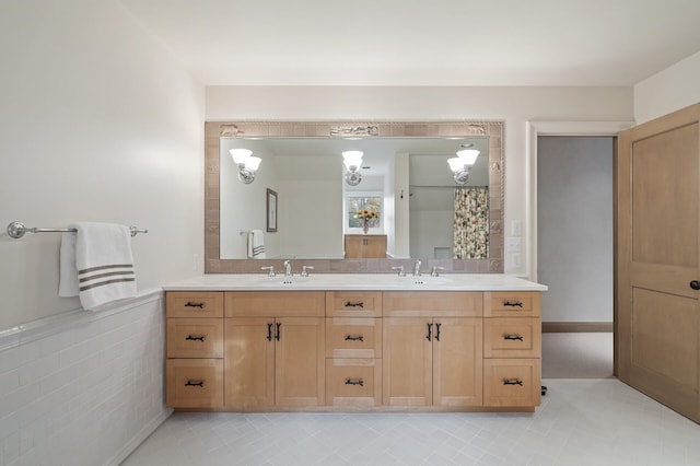 781 Ferndale Rd N, Orono, MN 55391 - full bathroom featuring a sink, double vanity, and tile patterned flooring