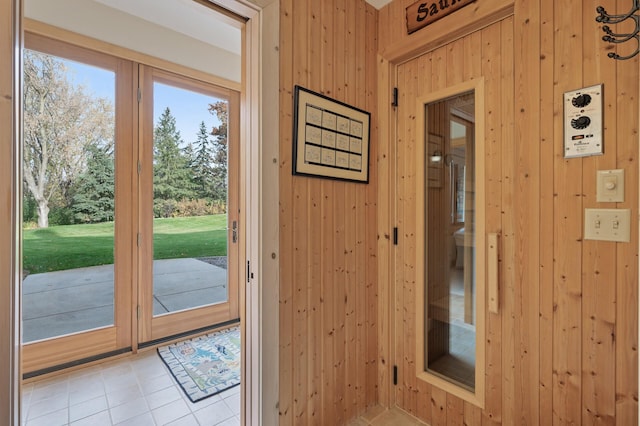 781 Ferndale Rd N, Orono, MN 55391 - doorway to outside with wooden walls and light tile patterned flooring
