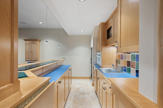 781 Ferndale Rd N, Orono, MN 55391 - kitchen featuring white oven, baseboards, light brown cabinets, and recessed lighting