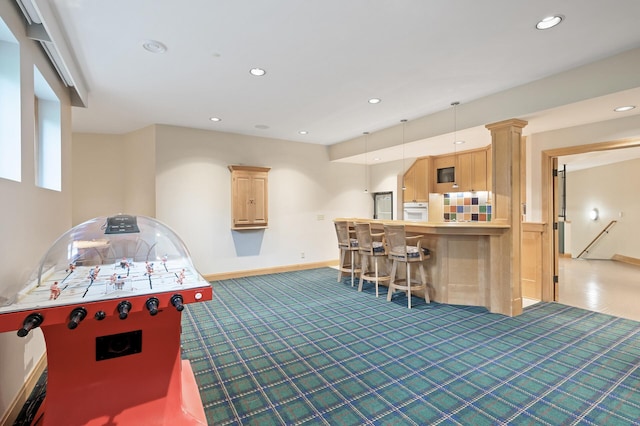 781 Ferndale Rd N, Orono, MN 55391 - recreation room featuring baseboards, dark colored carpet, recessed lighting, and a dry bar