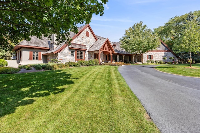 781 Ferndale Rd N, Orono, MN 55391 - view of front of house featuring stone siding and a front yard