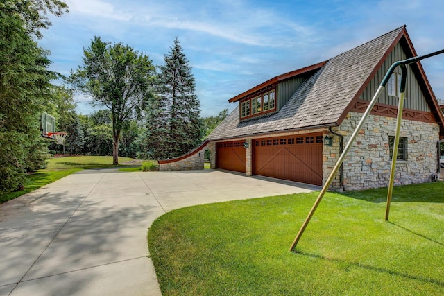 781 Ferndale Rd N, Orono, MN 55391 - view of side of home featuring a yard, concrete driveway, and stone siding