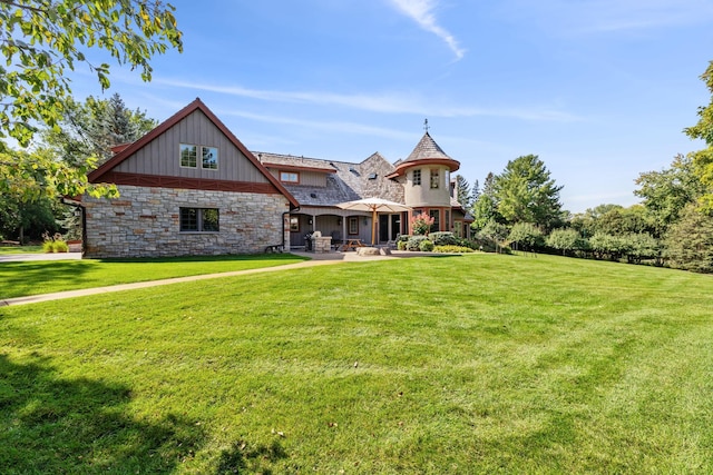 781 Ferndale Rd N, Orono, MN 55391 - exterior space with stone siding, a patio, and a front lawn
