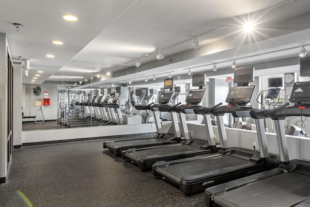 workout area with recessed lighting