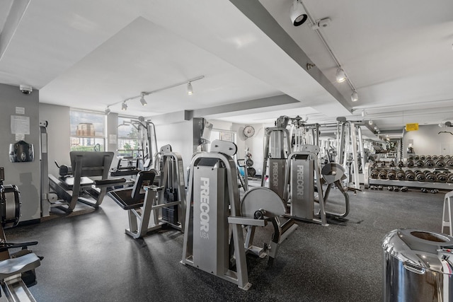 exercise room with rail lighting