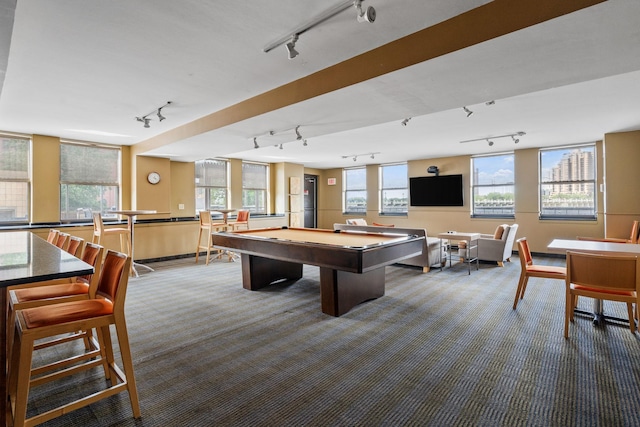 recreation room with track lighting, carpet, billiards, and baseboards