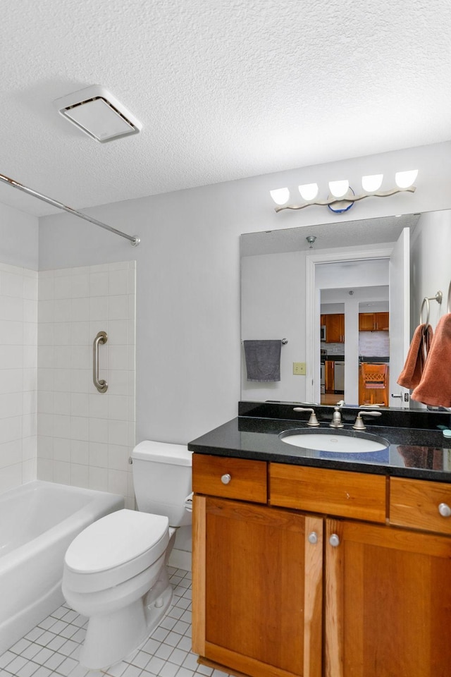 full bath with a textured ceiling, toilet, tile patterned floors, vanity, and shower / bathtub combination