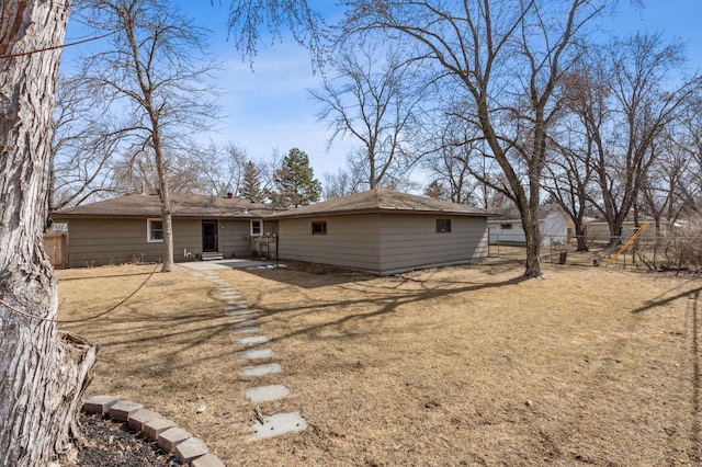 back of house with a patio area and fence