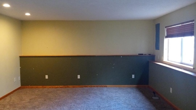 carpeted spare room with recessed lighting and baseboards