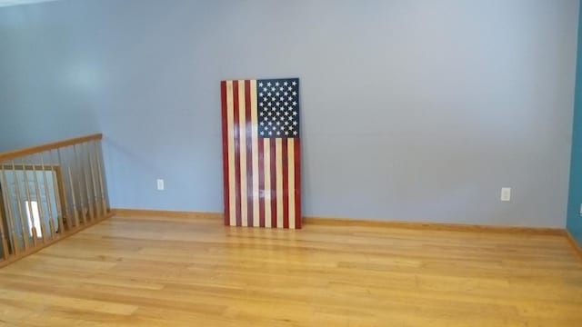 220 35th Ave N, Saint Cloud, MN 56303 - spare room featuring wood finished floors