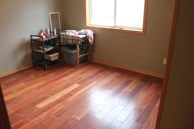 220 35th Ave N, Saint Cloud, MN 56303 - office area with light wood-type flooring and baseboards