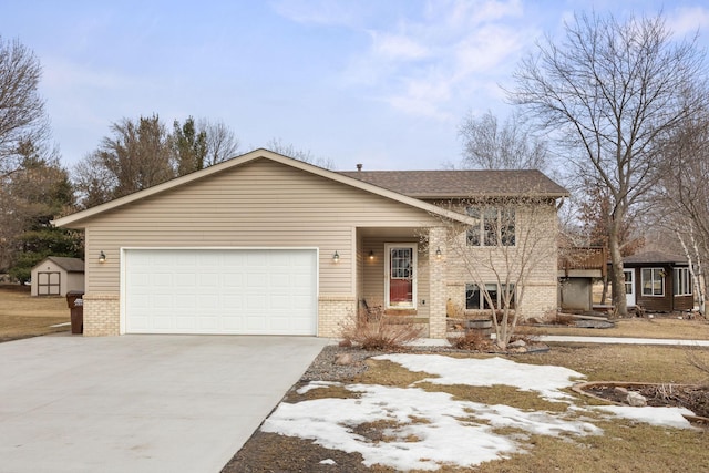 view of front of house featuring an attached garage, brick siding, and driveway