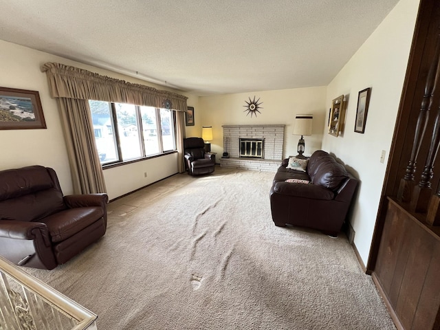 carpeted living room featuring a brick fireplace, a textured ceiling, and baseboards