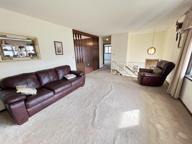 living area featuring carpet