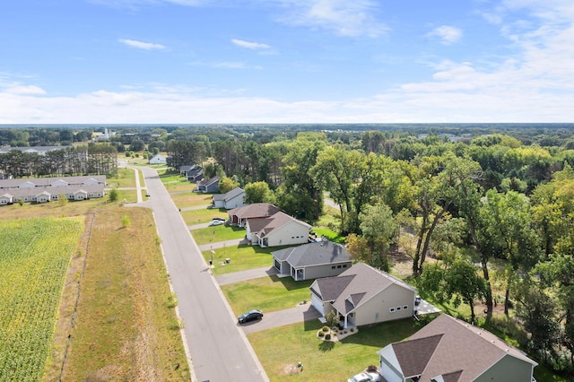 birds eye view of property with a residential view