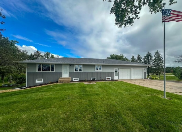 2593 6th St S, Sartell, MN 56377 - ranch-style house featuring an attached garage, driveway, a front lawn, and entry steps
