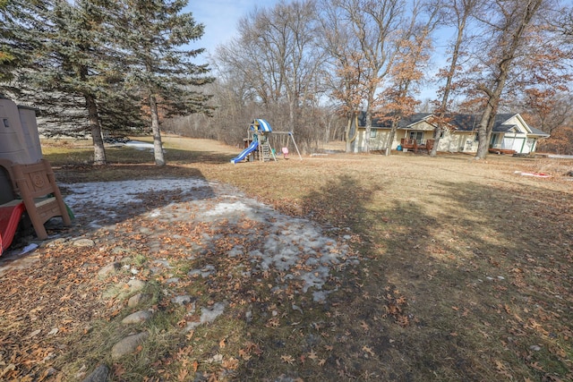 view of yard with a playground