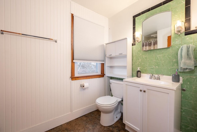 bathroom with toilet and vanity