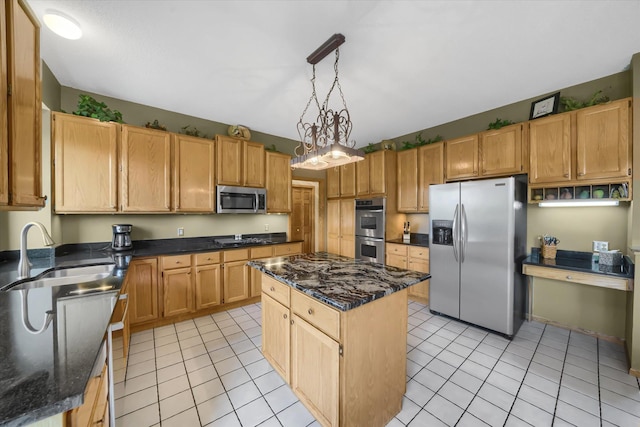 kitchen featuring a sink, light tile patterned flooring, a kitchen island, and stainless steel appliances