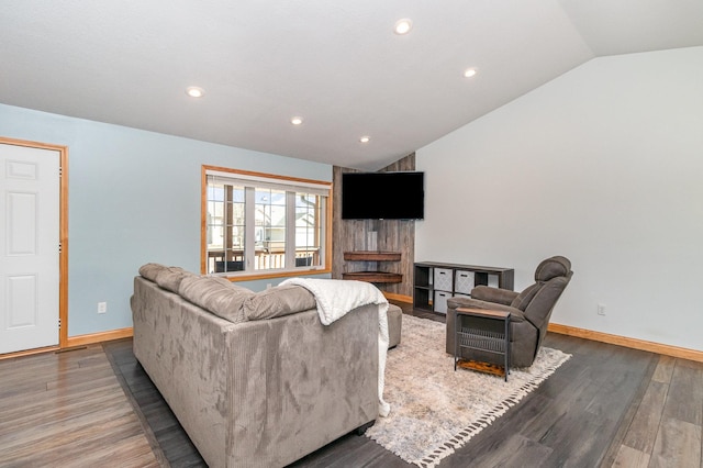 living area with recessed lighting, baseboards, lofted ceiling, and wood finished floors