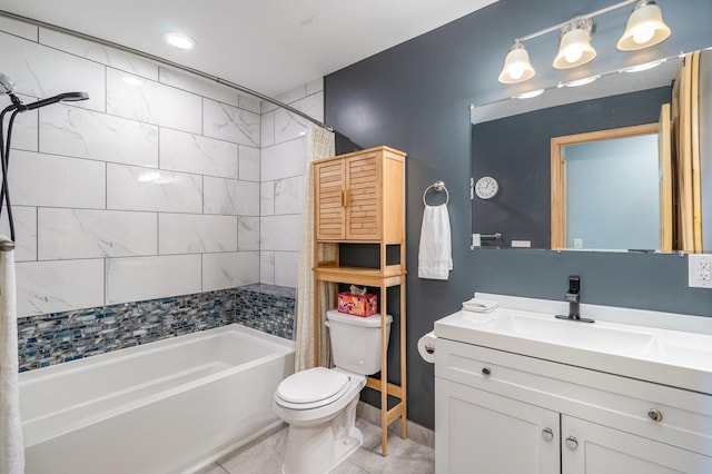 bathroom featuring vanity, toilet, and shower / bathing tub combination