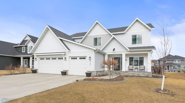 view of front of house featuring board and batten siding, a shingled roof, covered porch, driveway, and an attached garage