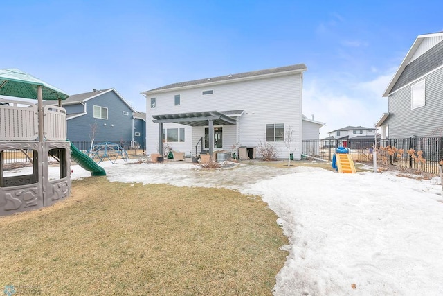 rear view of house featuring a patio, fence, a yard, a pergola, and a playground